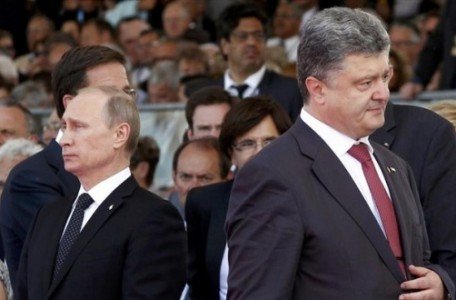 Συγκλίνουν οι απόψεις Ποροσένκο – Πούτιν – Αρνητικός ο Γιατσενιούκ