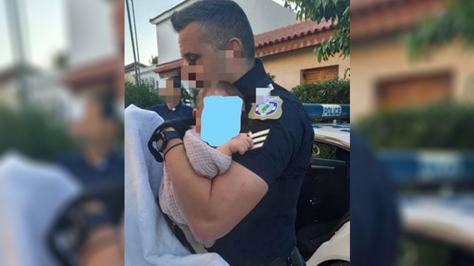 Έγκλημα στα Γλυκά Νερά - Συγκινητικό στιγμιότυπο: Αστυνομικός κρατά αγκαλιά το βρέφος της άτυχης Καρολάιν